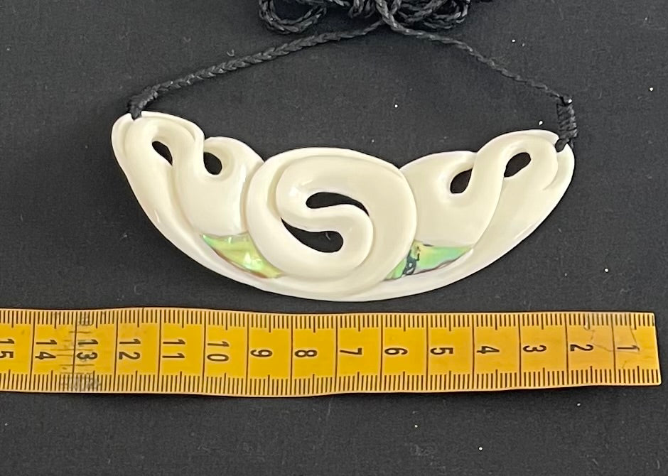 Little $40 Breast Plate Pendant - Bone Carving