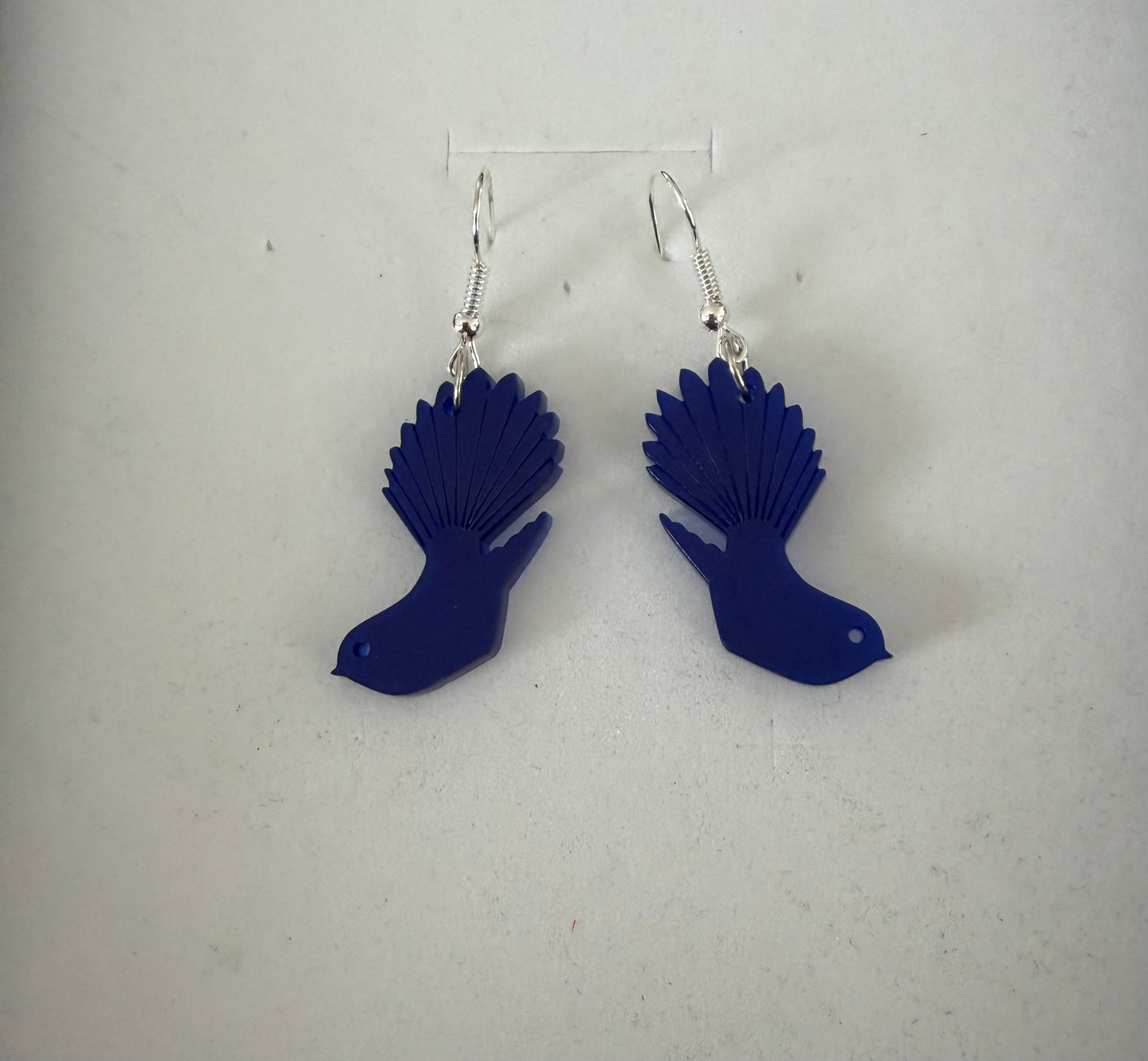 Little blue resin fantail earrings