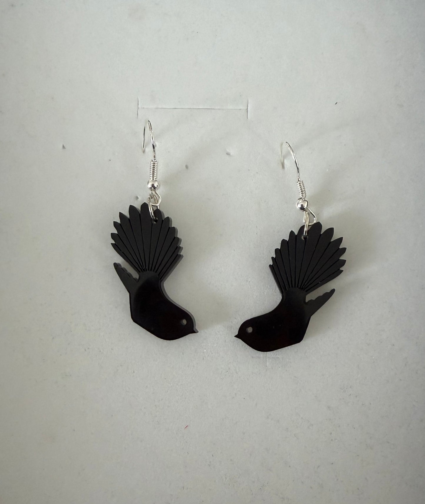 Little black resin fantail earrings