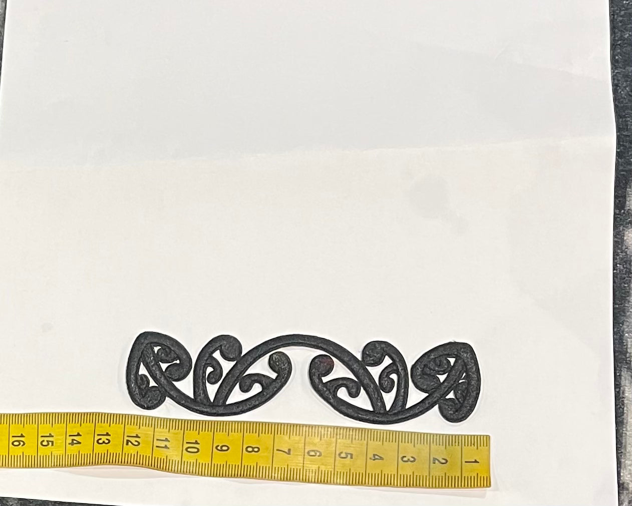 Iron on embroidered koru black
