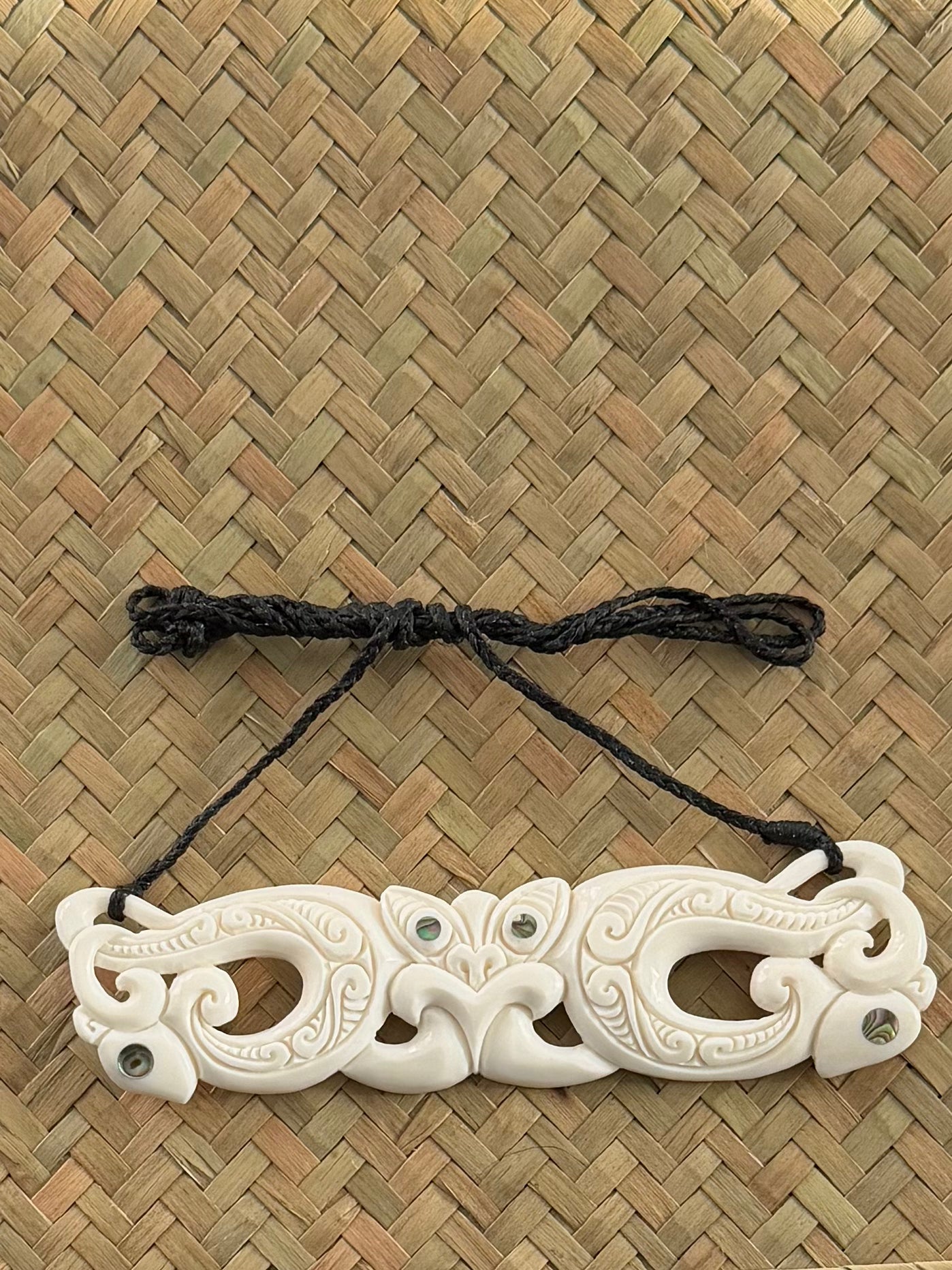 Carved Manaia Breastplate with Tiki Face