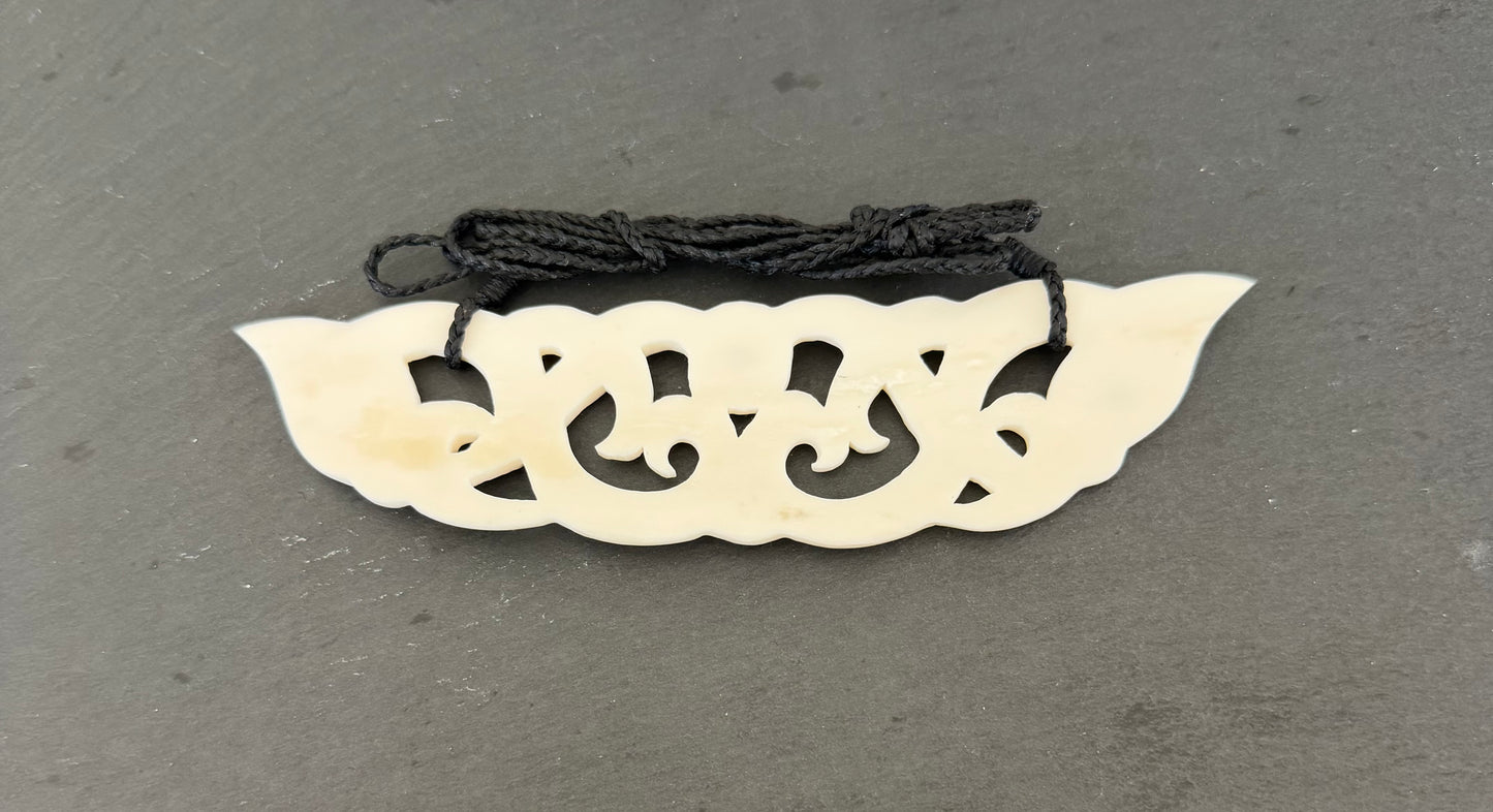 SECONDS Beef Bone Carved breastplate. Check out the pictures before you buy as they are marked no 6