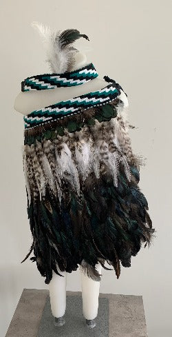 Korowai, a traditional Maori cloak with deep historical and cultural significance.