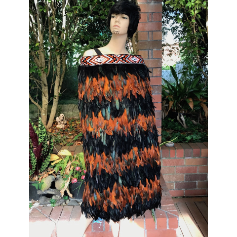 Korowai, a traditional Maori cloak with deep historical and cultural significance.