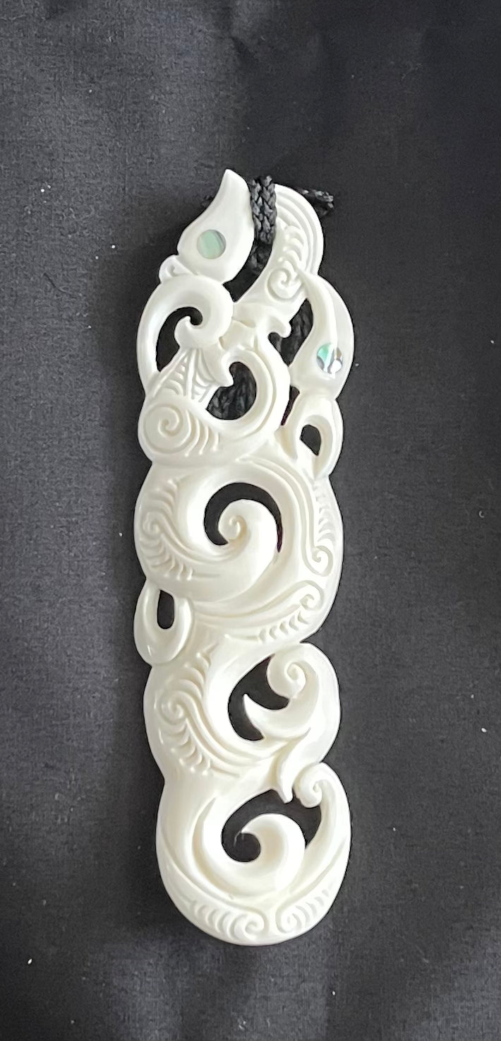 Toki Pendant - Bone Carving