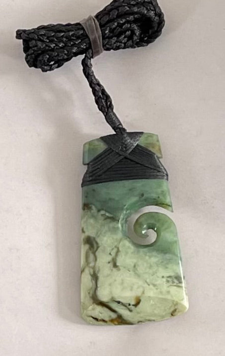 Toki with Koru Pounamu Necklace