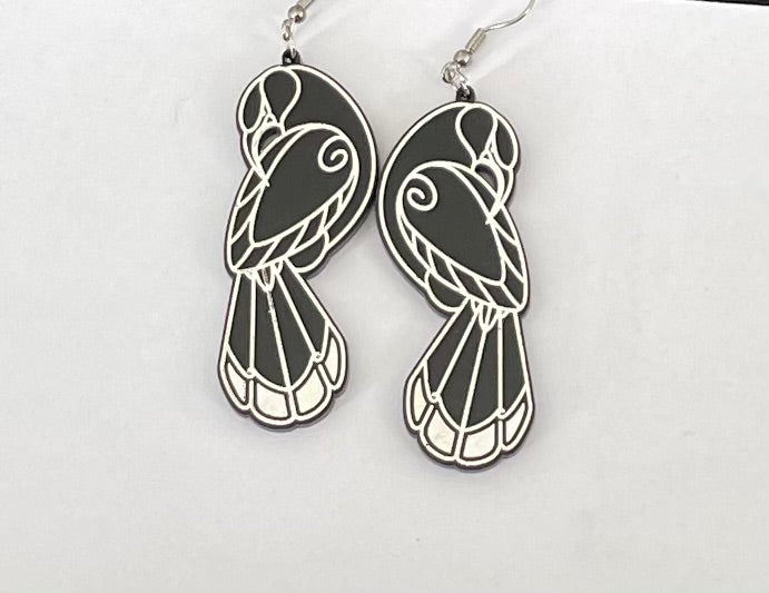 Black and white resin Tui Earrings