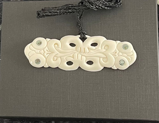 Hei Tiki Pendant - Beef Bone Carving