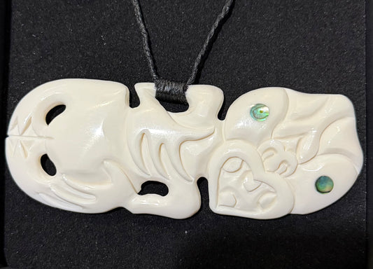 Sideway Bone Tiki Pendant
