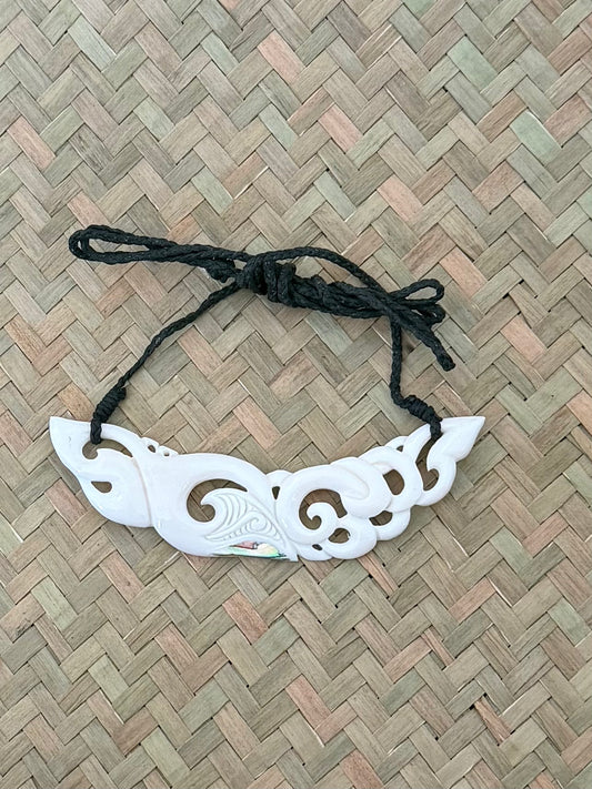 Carved beef bone breastplate