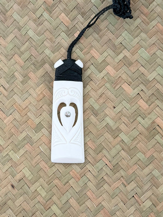 Carved beef bone pendant with-heart