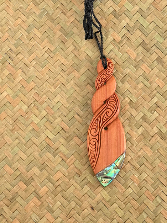 Wooden twist with Paua Pendant - Carving