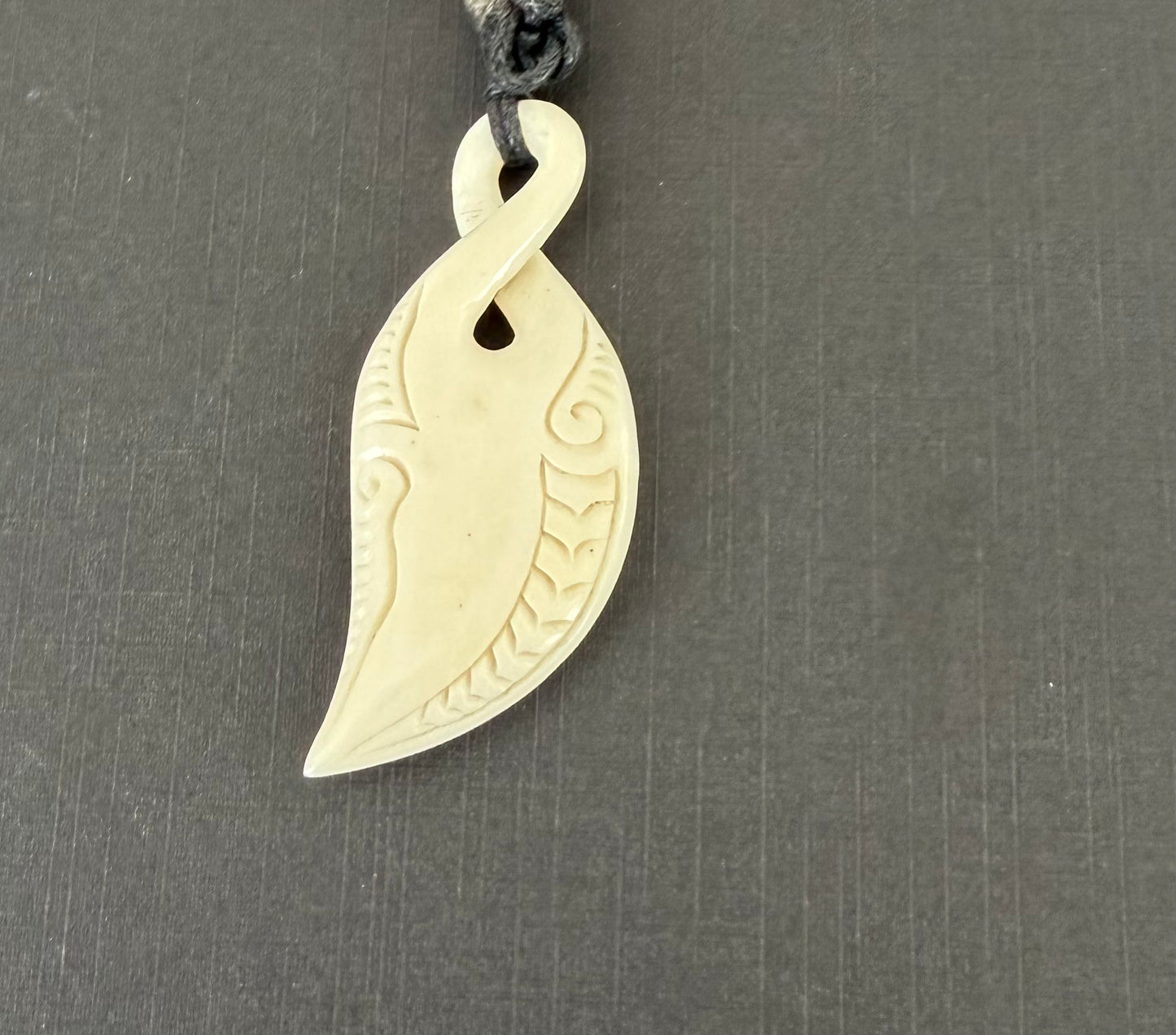 Beef bone pendant