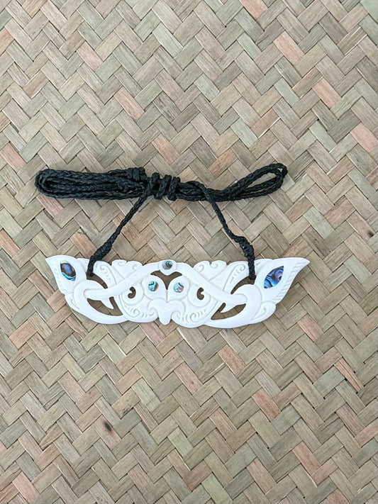 Carved beef bone breastplate