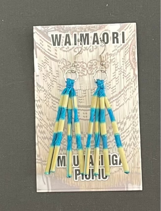 Pair of blue and yellow striped piupiu  earrings on a Waimaori branded card.