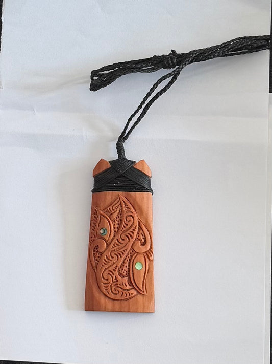 Wooden Toki Pendant Carving