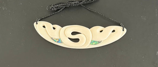 Twist koru breastplate- Bone Carving
