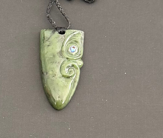 Carved drop greenstone