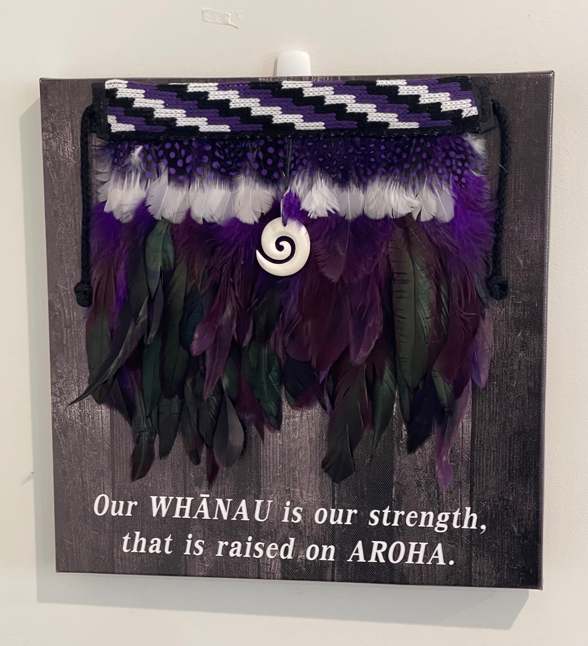 Korowai On Canvas With a Saying - Whanau Aroha