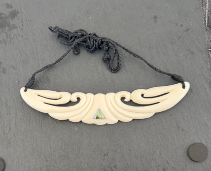 SECONDS Beef Bone Carved breastplate. Check out the pictures before you buy as they are marked no 5