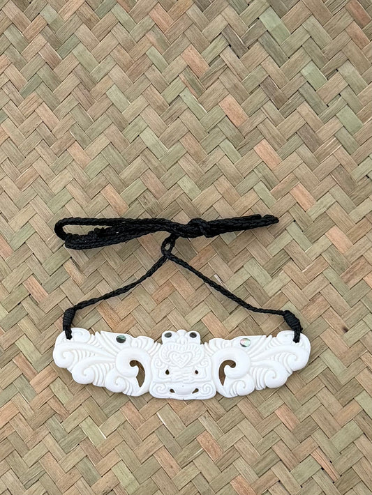 Carved beef bone breastplate