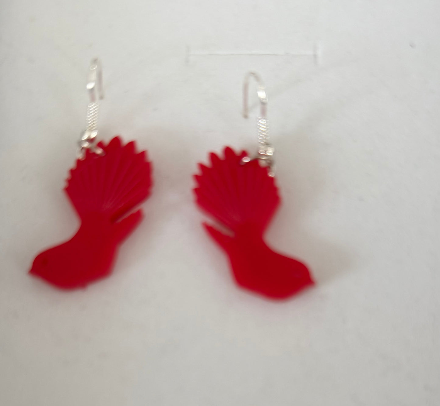 Little red resin fantail earrings