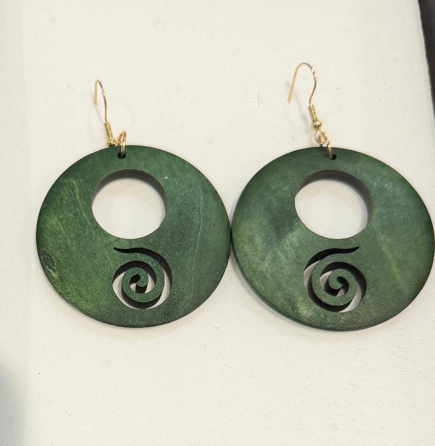 Wooden green koru earrings