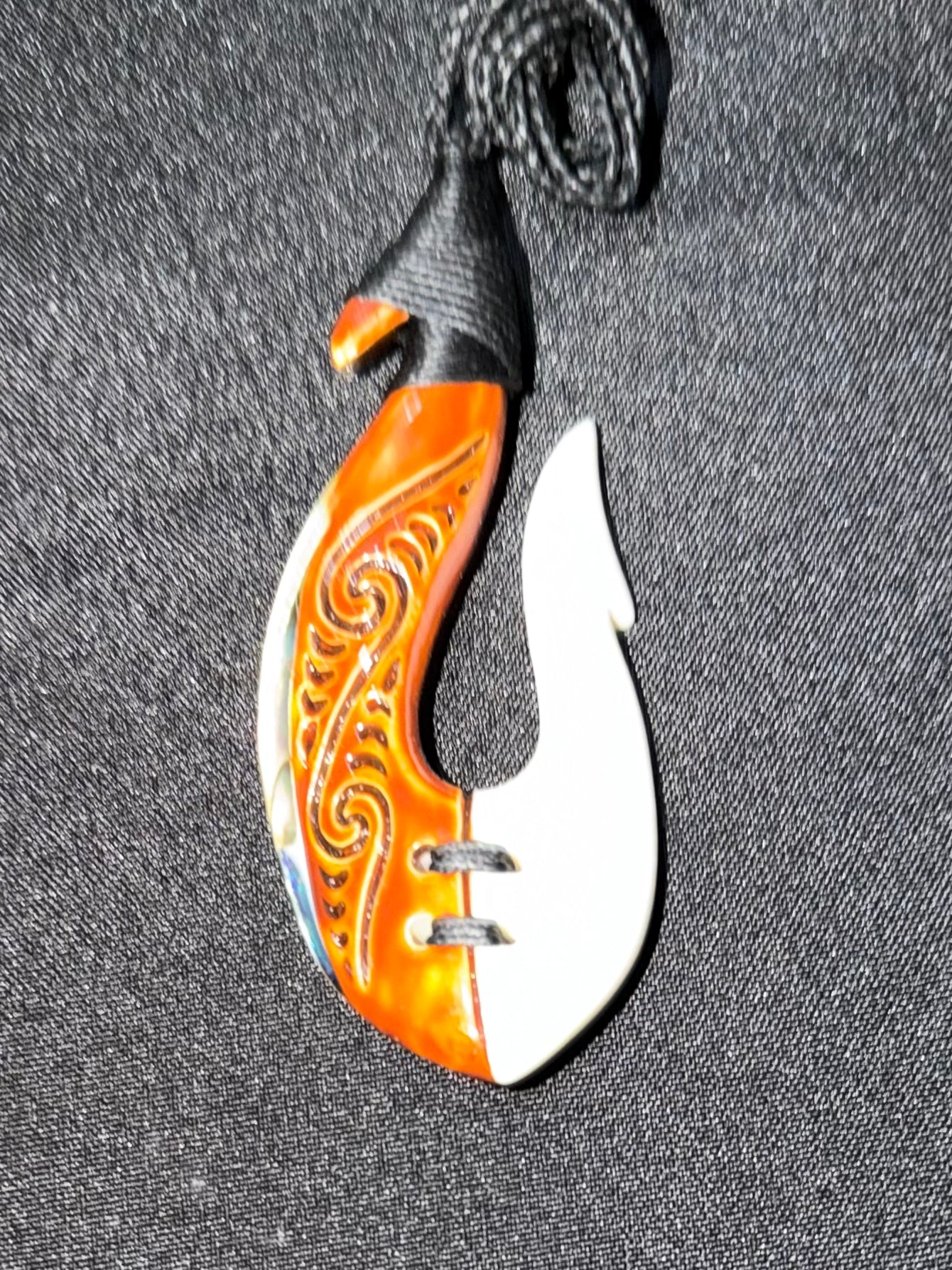Hook With Brown Stain and Paua down the side Bone Carving