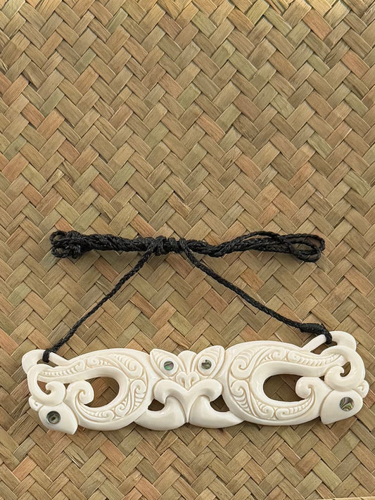 Carved Manaia Breastplate with Tiki Face
