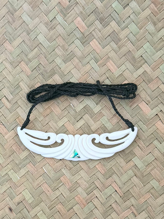 Carved beef bone breastplate
