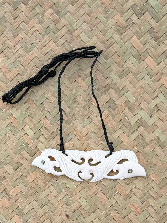 Carved beef bone breastplate