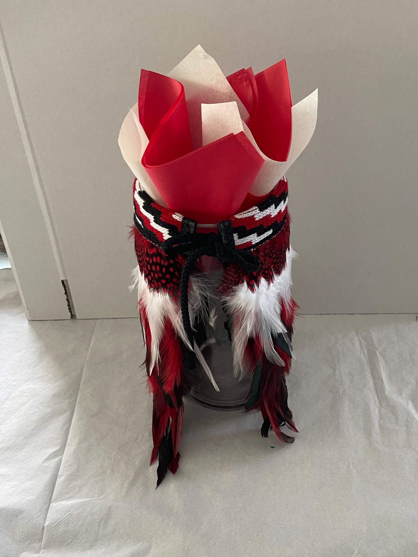 Decorative item with red and white Maori mini korowai 